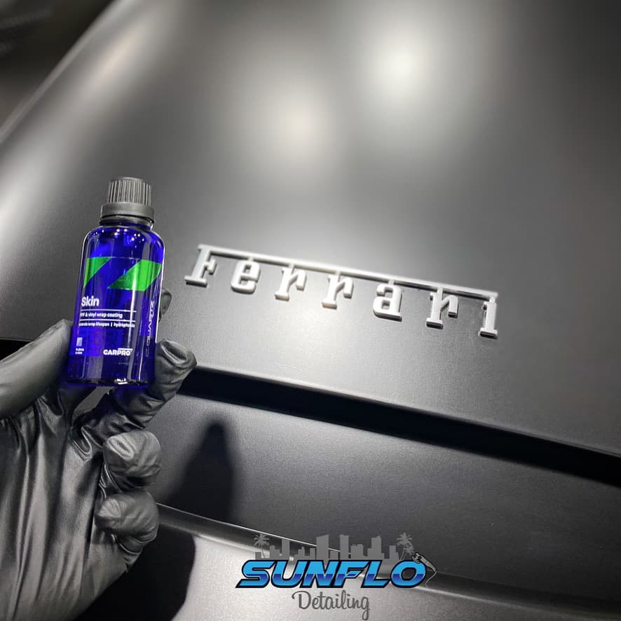 CarPro Skin vinyl wrap coating applied to a matte Ferrari