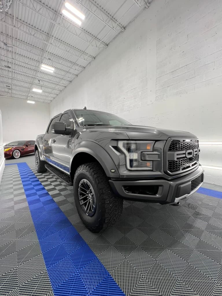 Ford F-150 Raptor inside the Oakland Park shop after a full exterior detail