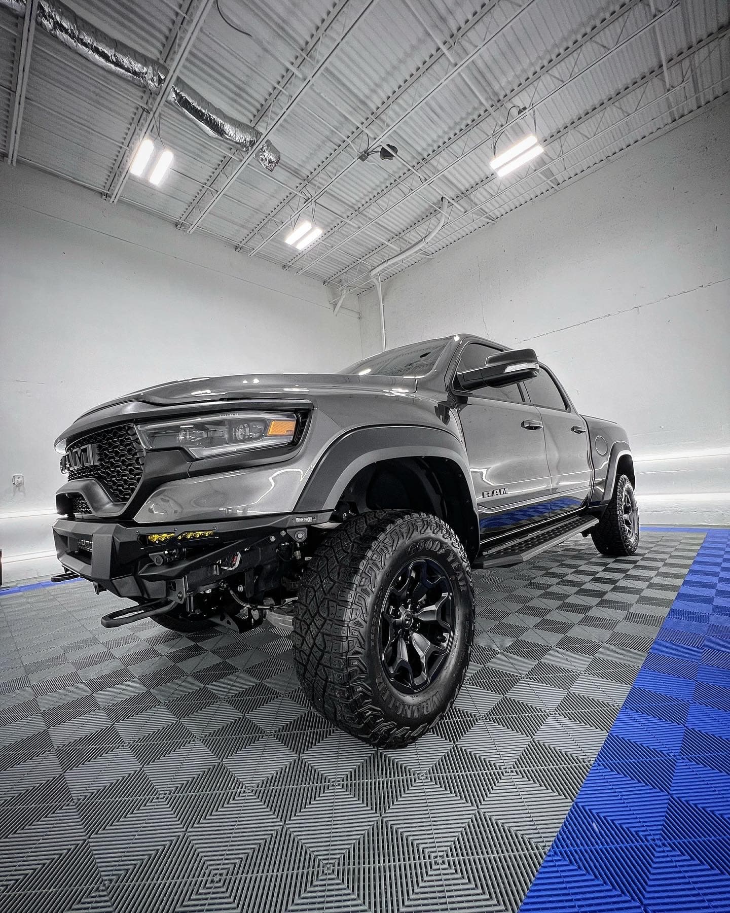 Lifted RAM 1500 TRX inside the Sunflo shop after a full exterior detail