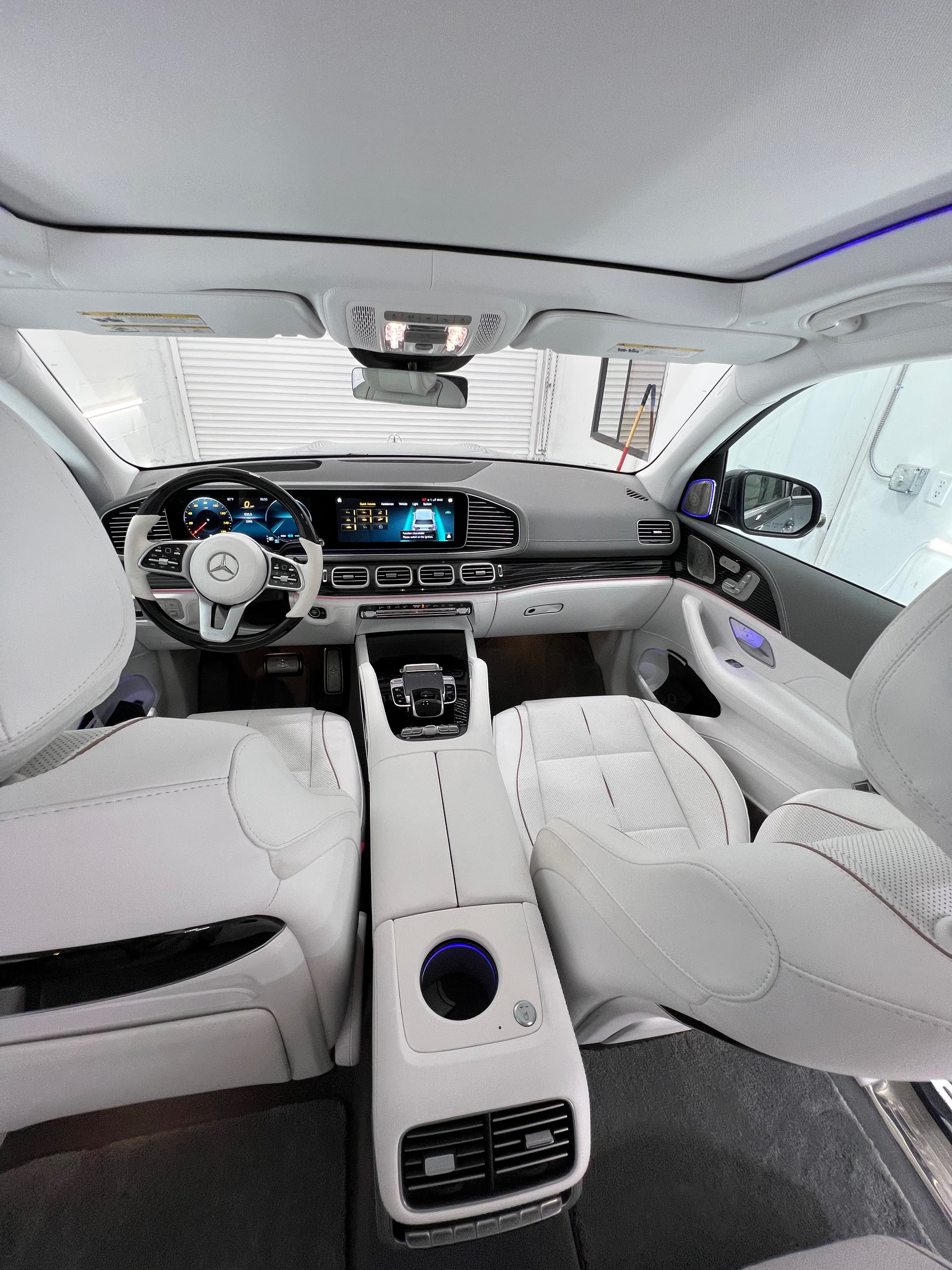Mercedes-Maybach GLS interior — white leather dashboard and ambient lighting after a deep interior detail